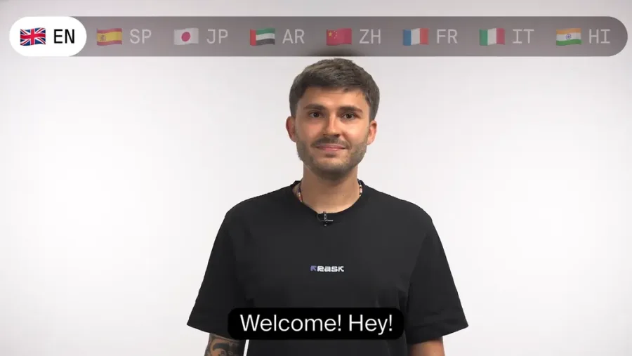 Rask AI の動画翻訳イメージ。上部に EN・SP・JP・AR・ZH・FR・IT・HI の言語切り替えバーが並び、話す人物の映像に「Welcome! Hey!」の字幕が付いている